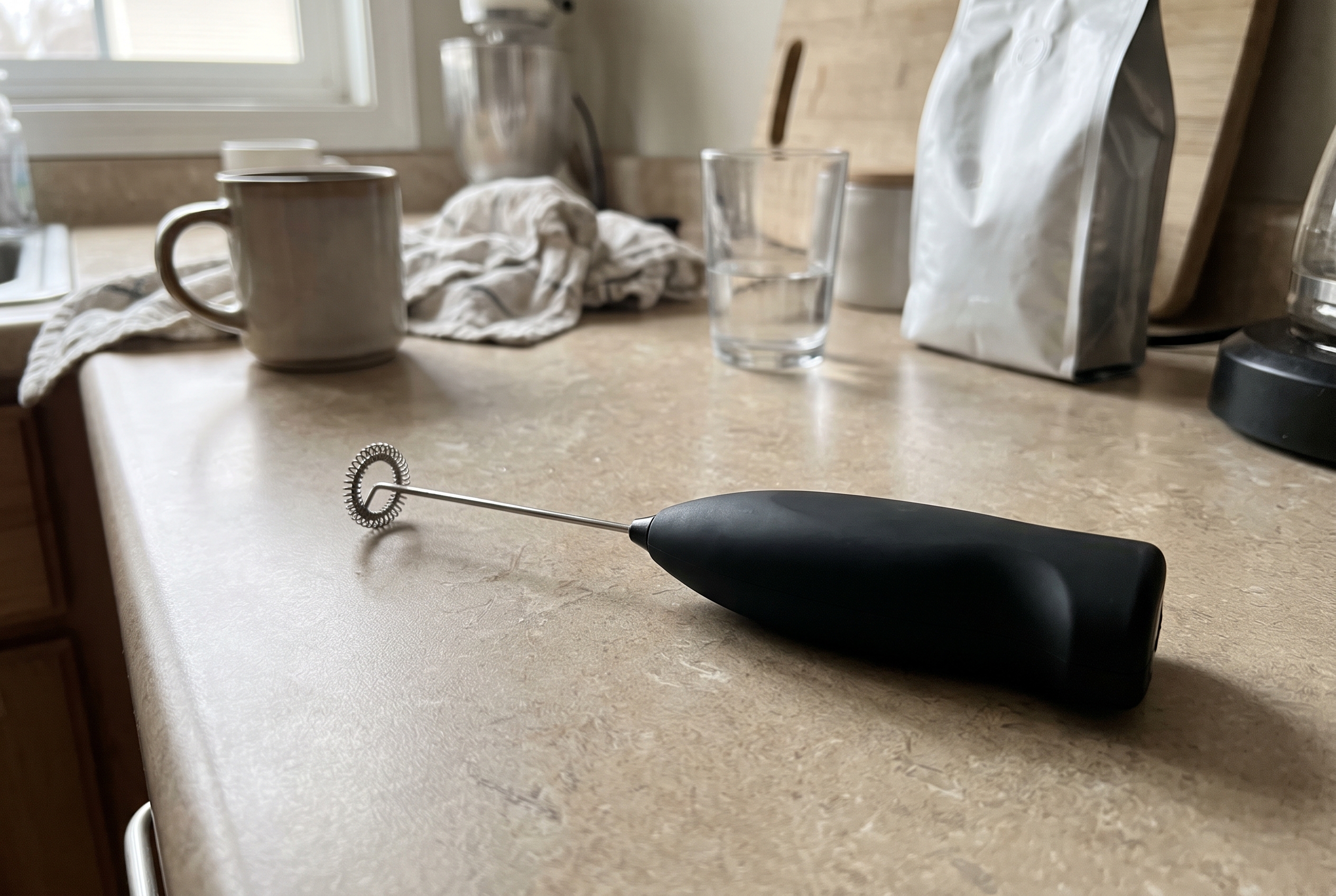 product video checklist example showing a phone snapshot of a handheld milk frother on a kitchen counter