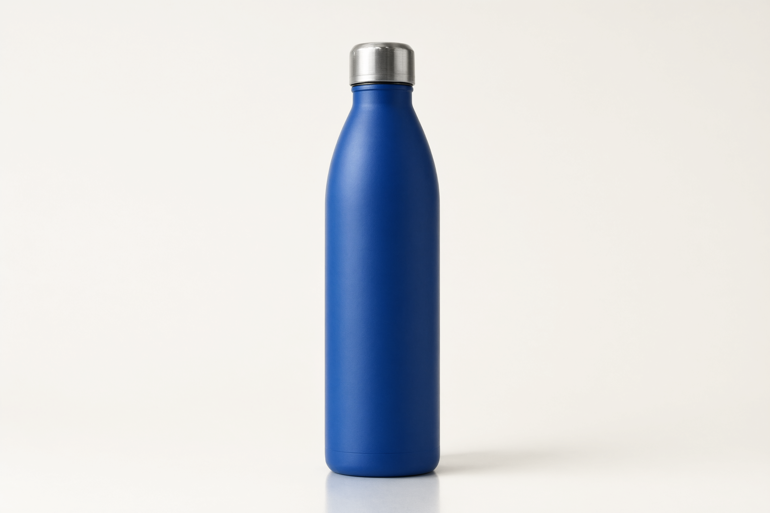 Cobalt blue insulated water bottle centered on an off white background